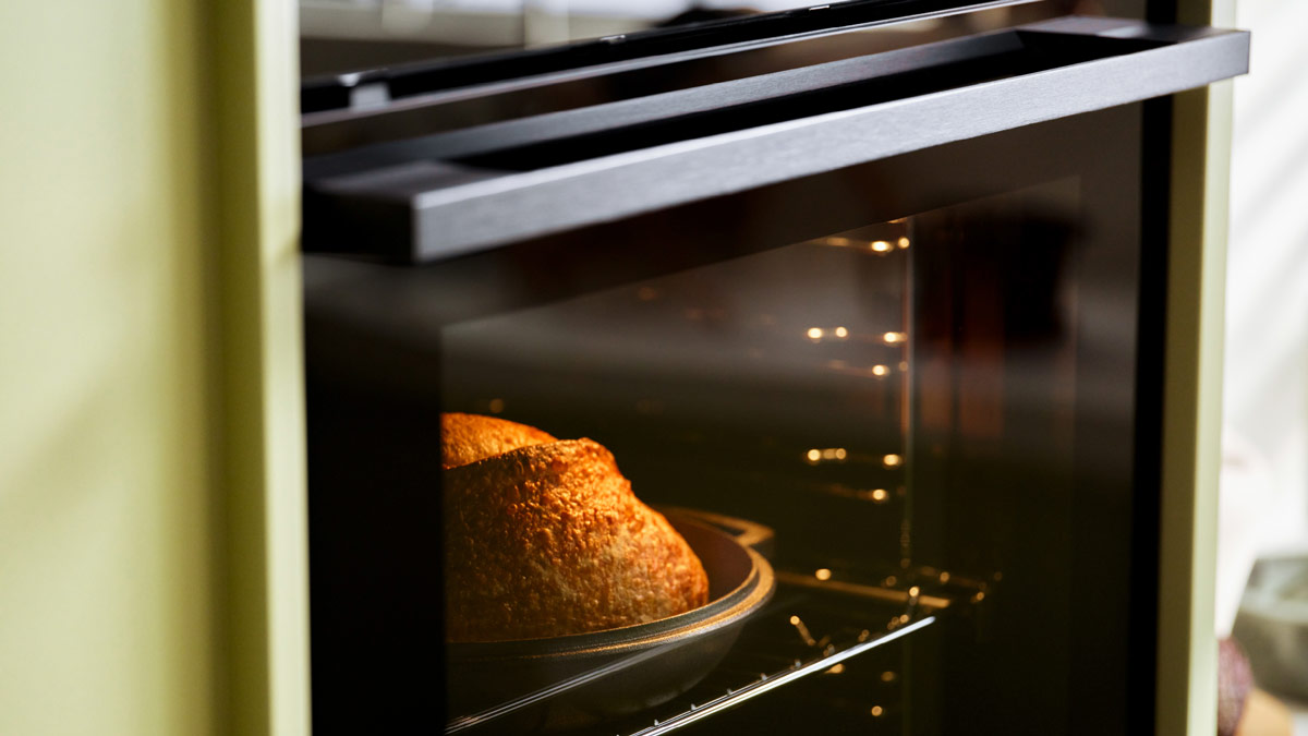 view of an oven showing cooked bread inside