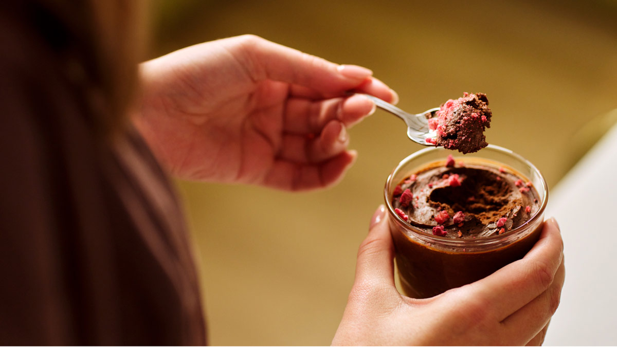 Getting chocolate out of a jar with a spoon